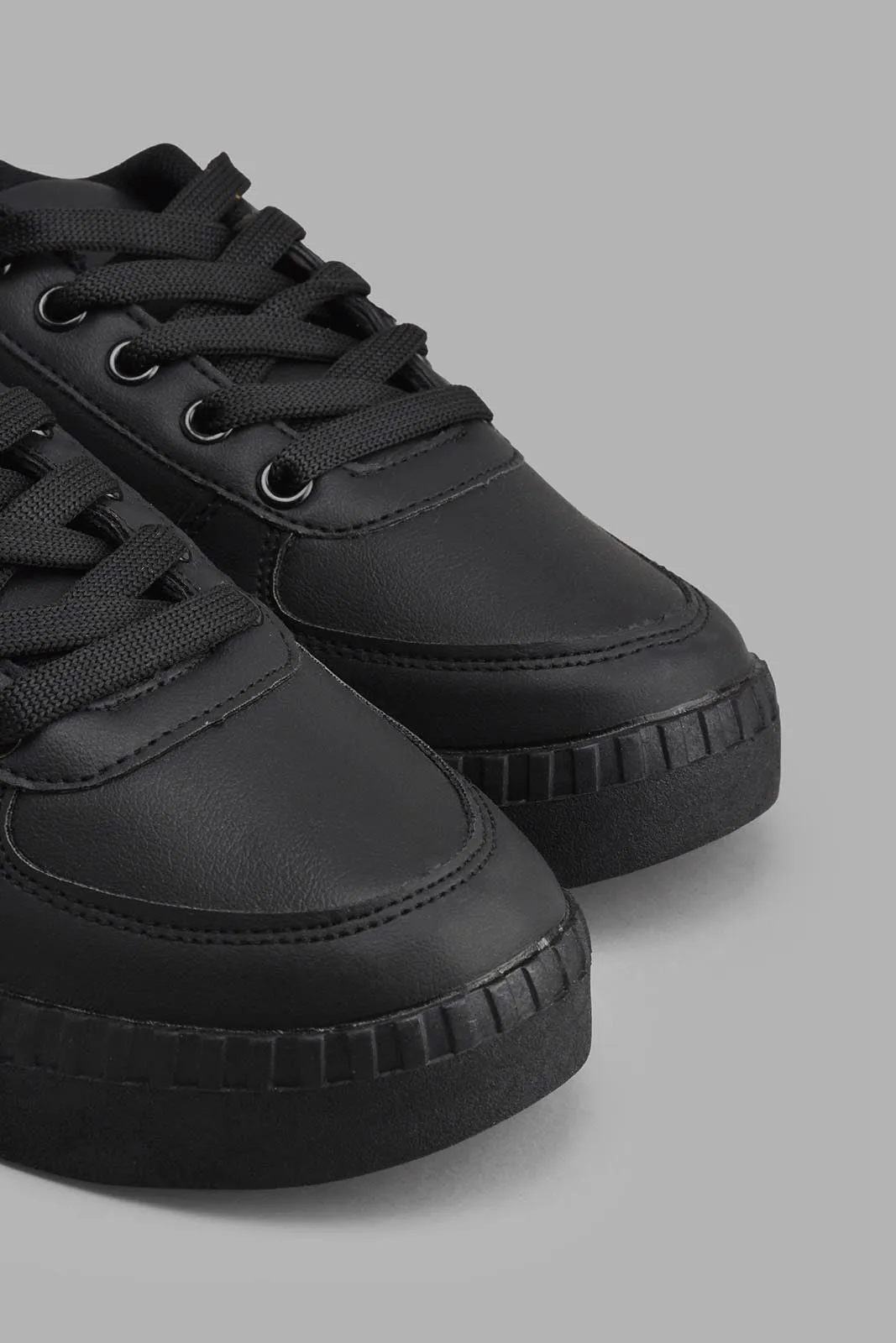 Black Ribbed Sneaker